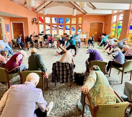Residents participating in a group exercise activity