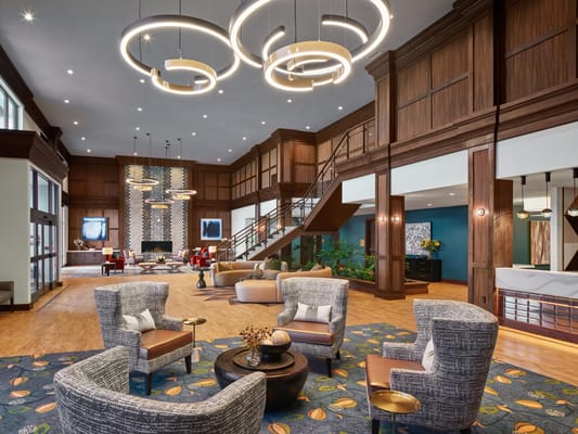 Bright and spacious lobby with modern decor and seating