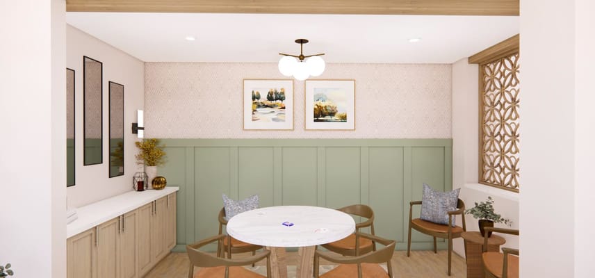 Interior common area with a dining table and artwork