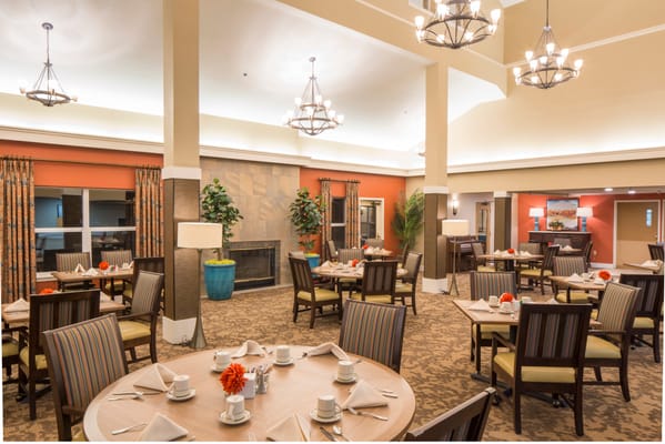 Dining room area with tables set for meals