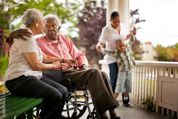 Residents enjoying time outdoors on the porch