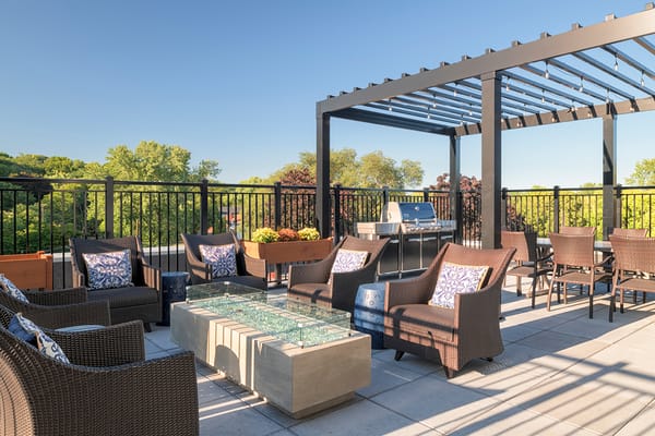 Rooftop outdoor seating area with modern furniture