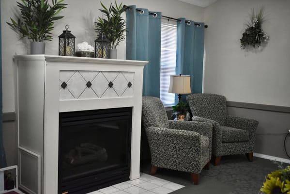Cozy common area with fireplace and seating