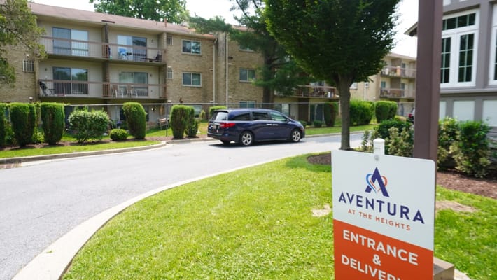 Entrance sign and view of the facility's exterior