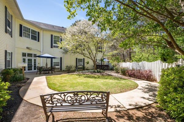 Outdoor area with benches and greenery