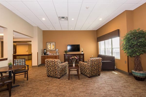 Cozy common area with seating and a television