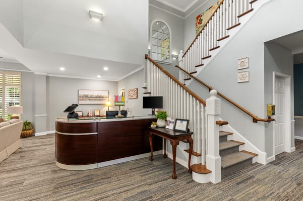 Bright and welcoming reception area with stairs
