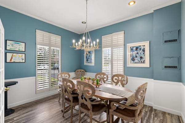 Bright dining room with a large wooden table