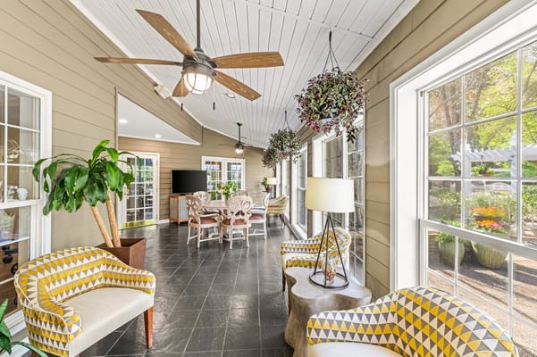 Bright common area with comfortable seating and natural light
