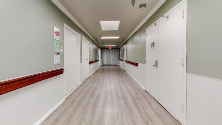 A hallway in a nursing home facility