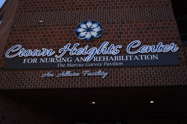 Facility logo on building facade