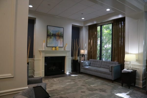 Living room with a fireplace and comfortable seating