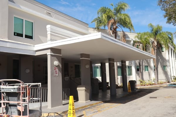 Entrance of Jackson Memorial Long-Term Care Center with covered awning