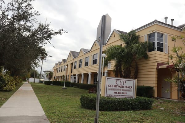 Exterior view of Courtyard Plaza assisted living facility