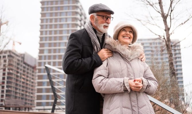 Couple enjoying outdoor space at a senior living facility