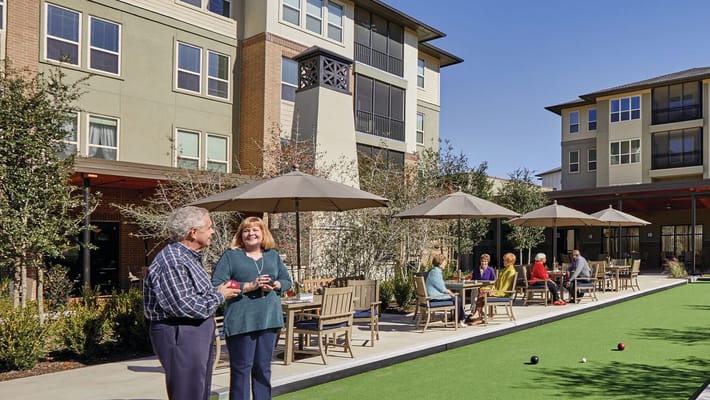 Residents enjoying outdoor activities at the facility