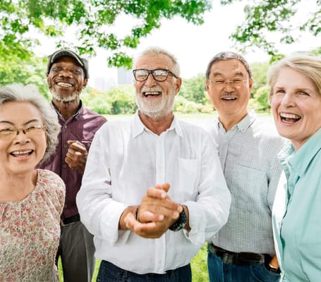 Group of happy seniors smiling outdoors