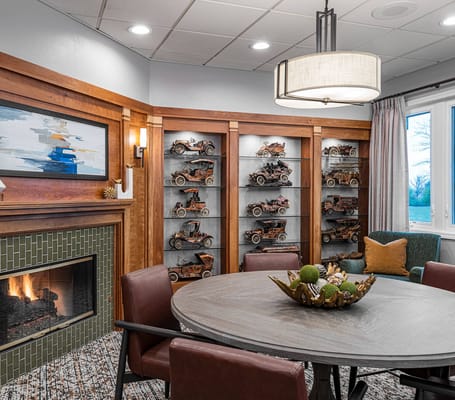 Cozy common area with a fireplace and unique decor