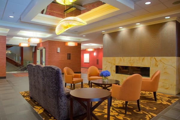 Interior lounge area with seating and fireplace