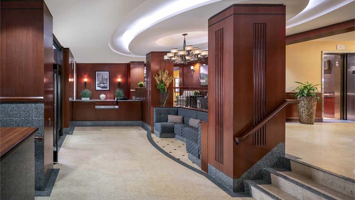 Lobby area with modern decor and seating at Atria West 86