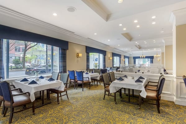 Bright dining room with neatly set tables