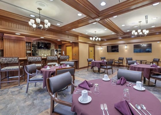 Interior dining room with tables set for service