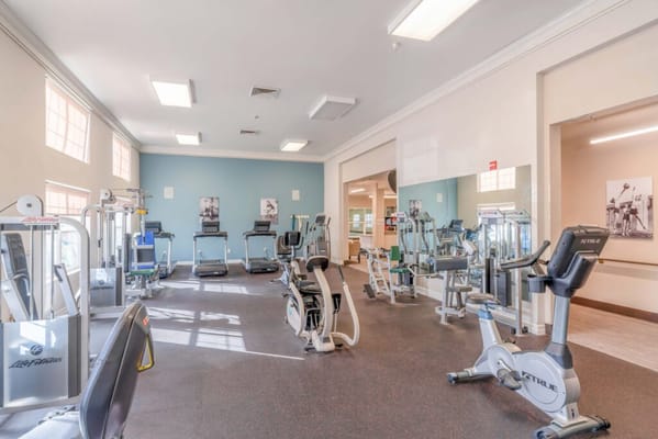 Interior view of a fitness center with exercise equipment