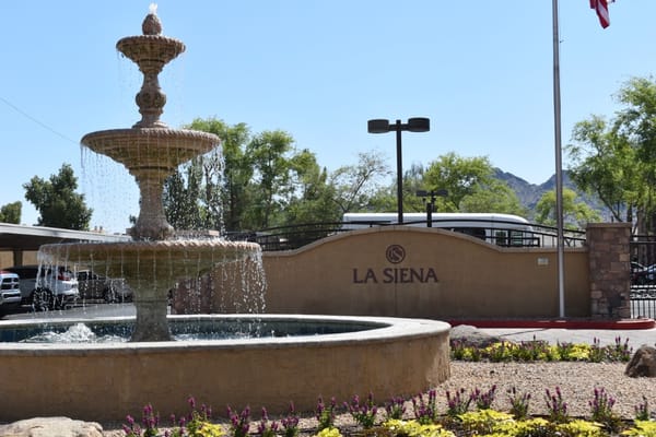 Exterior view of La Siena with a fountain