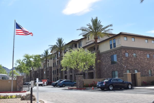 Exterior view of La Siena with American flag