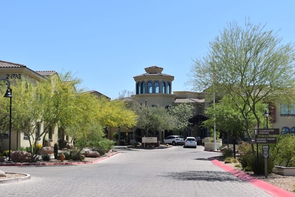 Entrance view of Clearwater Pinnacle Peak facility with landscaping
