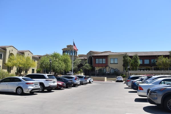 Exterior view of Clearwater Pinnacle Peak with parking lot
