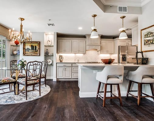 Bright kitchen and dining area with elegant furnishings
