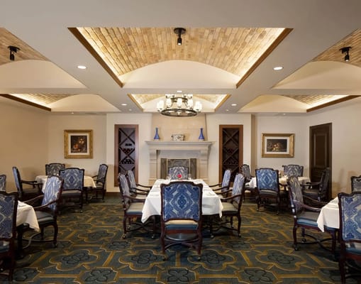 Spacious dining room with tables and stylish chairs