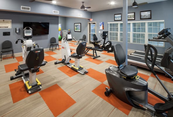 Interior view of a fitness room with exercise equipment