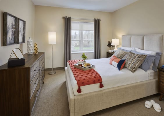 Cozy bedroom with a breakfast tray on the bed
