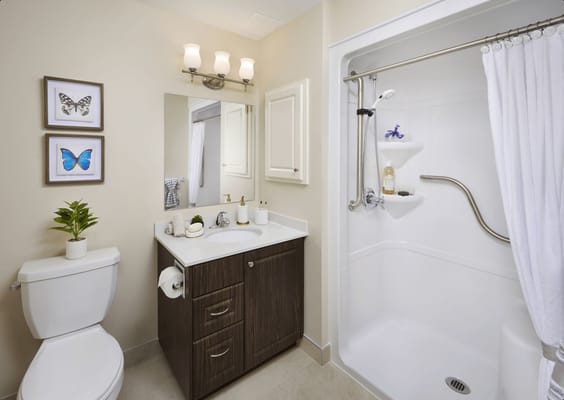 Modern bathroom with light fixtures and decor