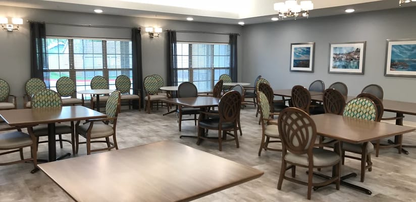 Spacious dining area with tables and chairs
