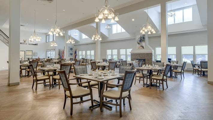 Spacious dining room set for meal service
