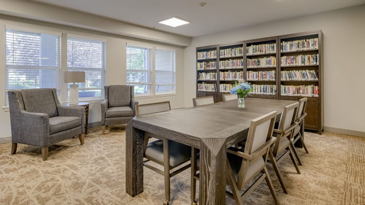 Interior library space with seating and bookshelves