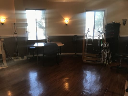 Interior common area with tables and equipment.