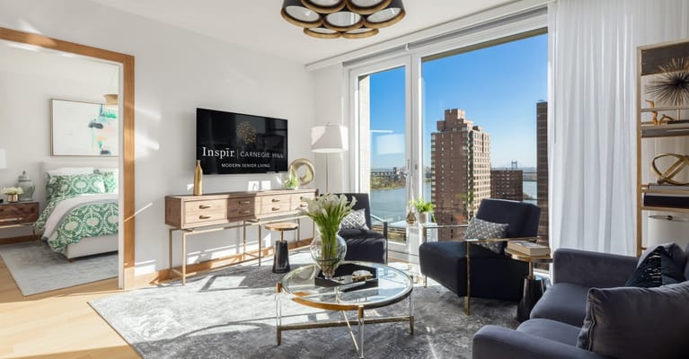 Modern living room with cityscape view and stylish furnishings