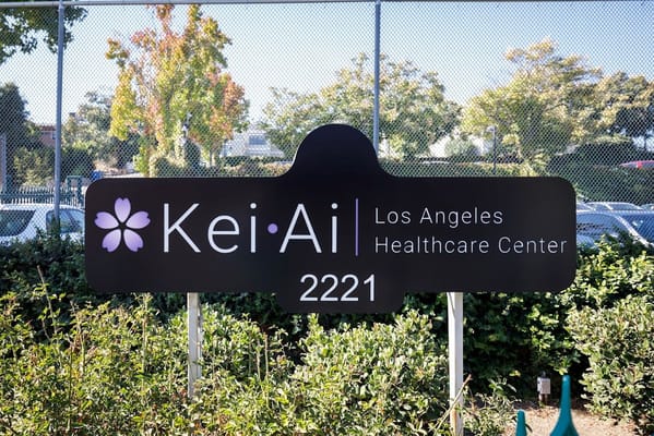 Facility logo and sign outdoors
