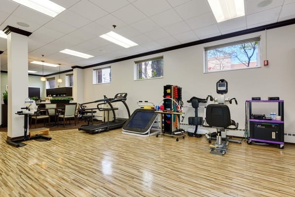Physical therapy room with exercise equipment