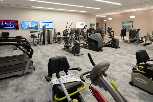 Exercise equipment in a well-lit fitness center