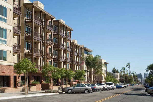 Exterior view of a senior living facility with balconies
