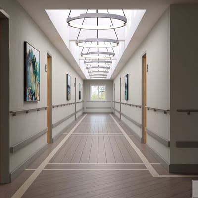 Bright, spacious hallway with artwork and natural light