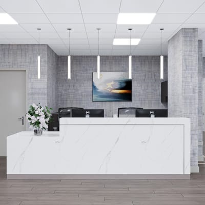 Modern reception area with a sleek white desk