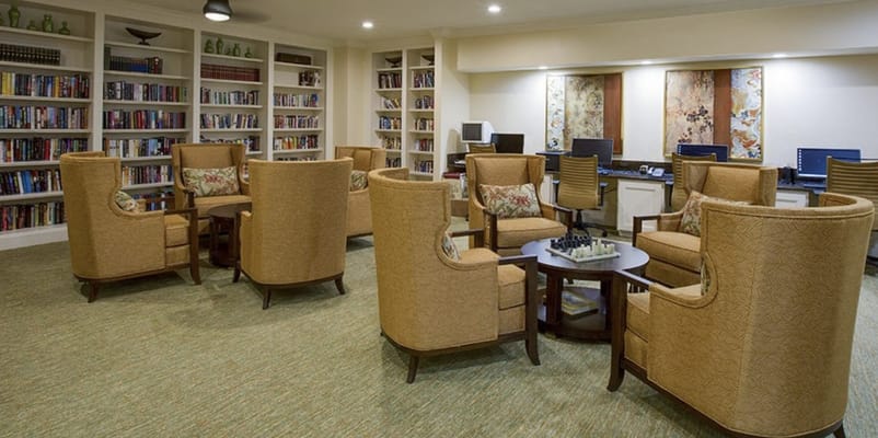 Comfortable lounge area with chairs and a chess set