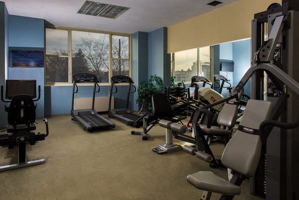 Interior view of a fitness room with exercise equipment