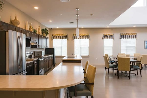 Bright common area with kitchen and dining space